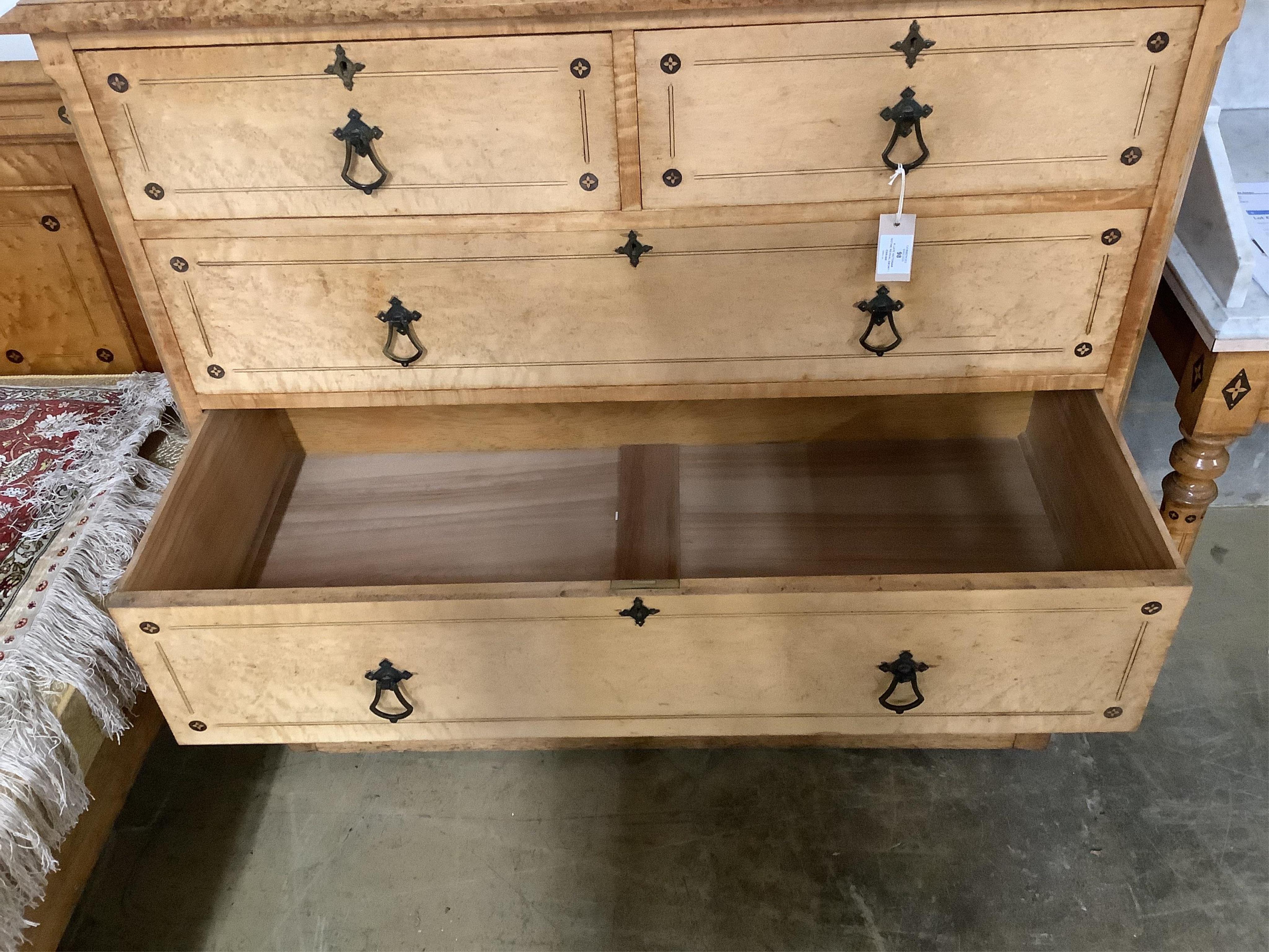 A late Victorian Gothic revival ebony inlaid, bird's eye maple bedroom suite, manner of Charles Bevan, comprising 5ft bed frame, kneehole dressing table, chest of drawers, marble top washstand, bedside cabinet, commode a